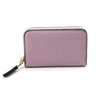 A rectangular, light purple faux leather coin purse with a zip fastening and a black tassel on the zip pull—ideal for stylishly carrying your essentials.