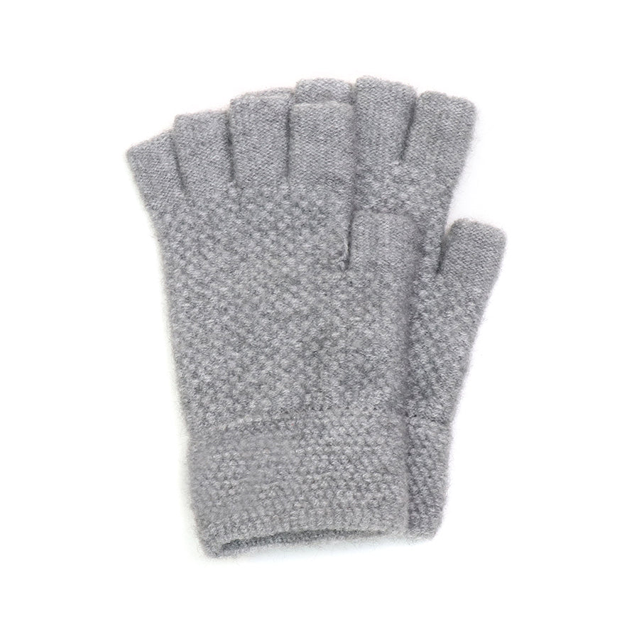 A pair of grey, knitted fingerless gloves made from vegan materials is shown lying flat on a white background.