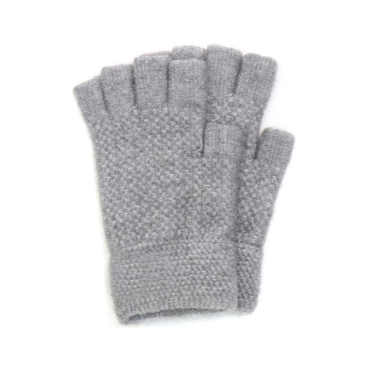 A pair of grey, knitted fingerless gloves made from vegan materials is shown lying flat on a white background.