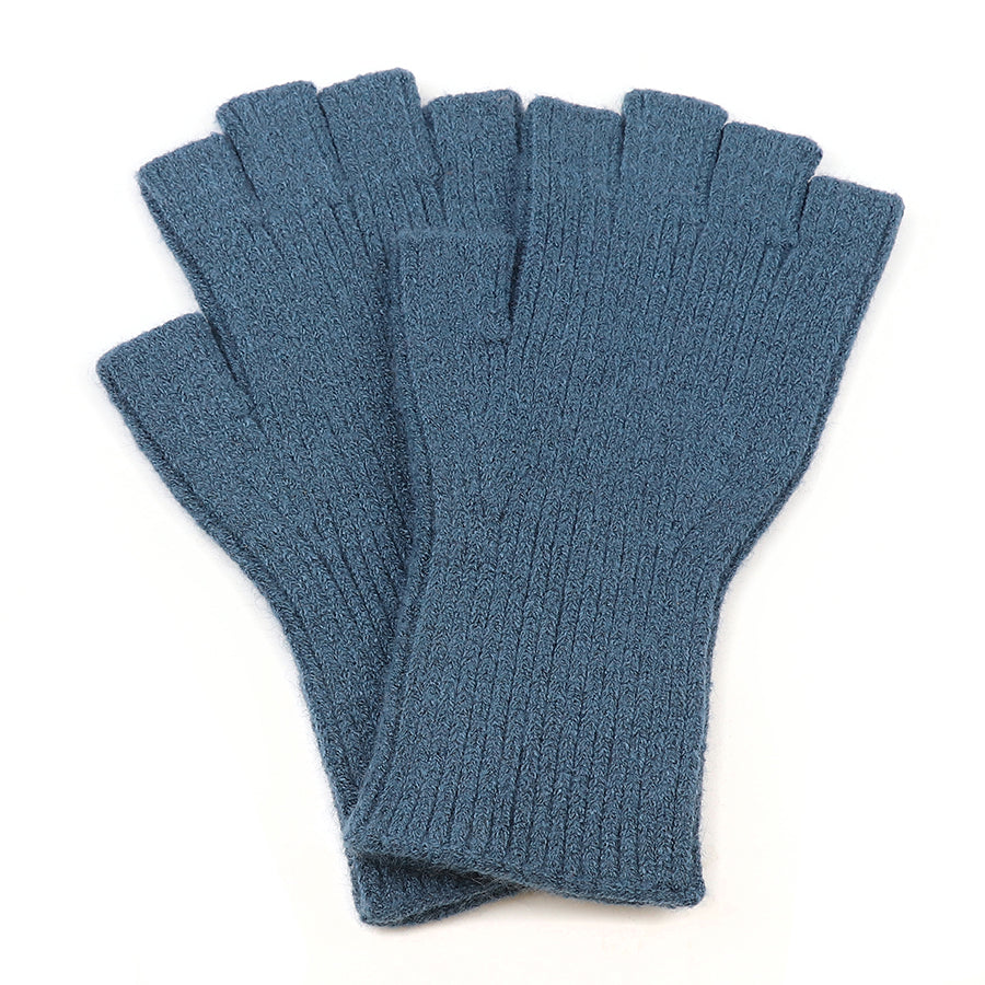 A pair of blue, ribbed, knitted fingerless gloves—made from vegan recycled material—are laid out flat, slightly overlapping each other on a white background.