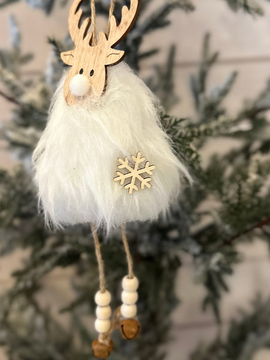 A fluffy white Christmas tree decoration featuring a wooden reindeer face, snowflake detail, and beaded legs makes a charming hanging deer ornament for your festive décor.