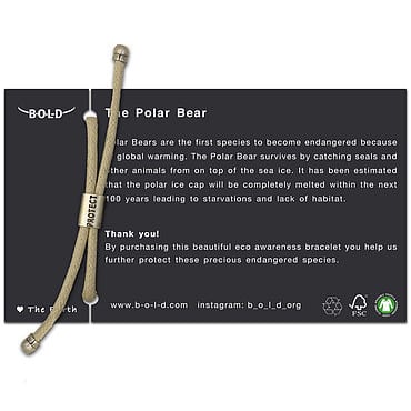 Eco-awareness bracelet named The Polar Bear, crafted from hand-dyed organic cotton, shown on a card detailing polar bear endangerment and support for endangered species via an ethical supply chain.