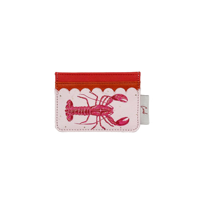 A colourful accessory, this Coral Lobster Card Holder boasts card slots, a red lobster illustration, pink scalloped edges, and a striking red top section.