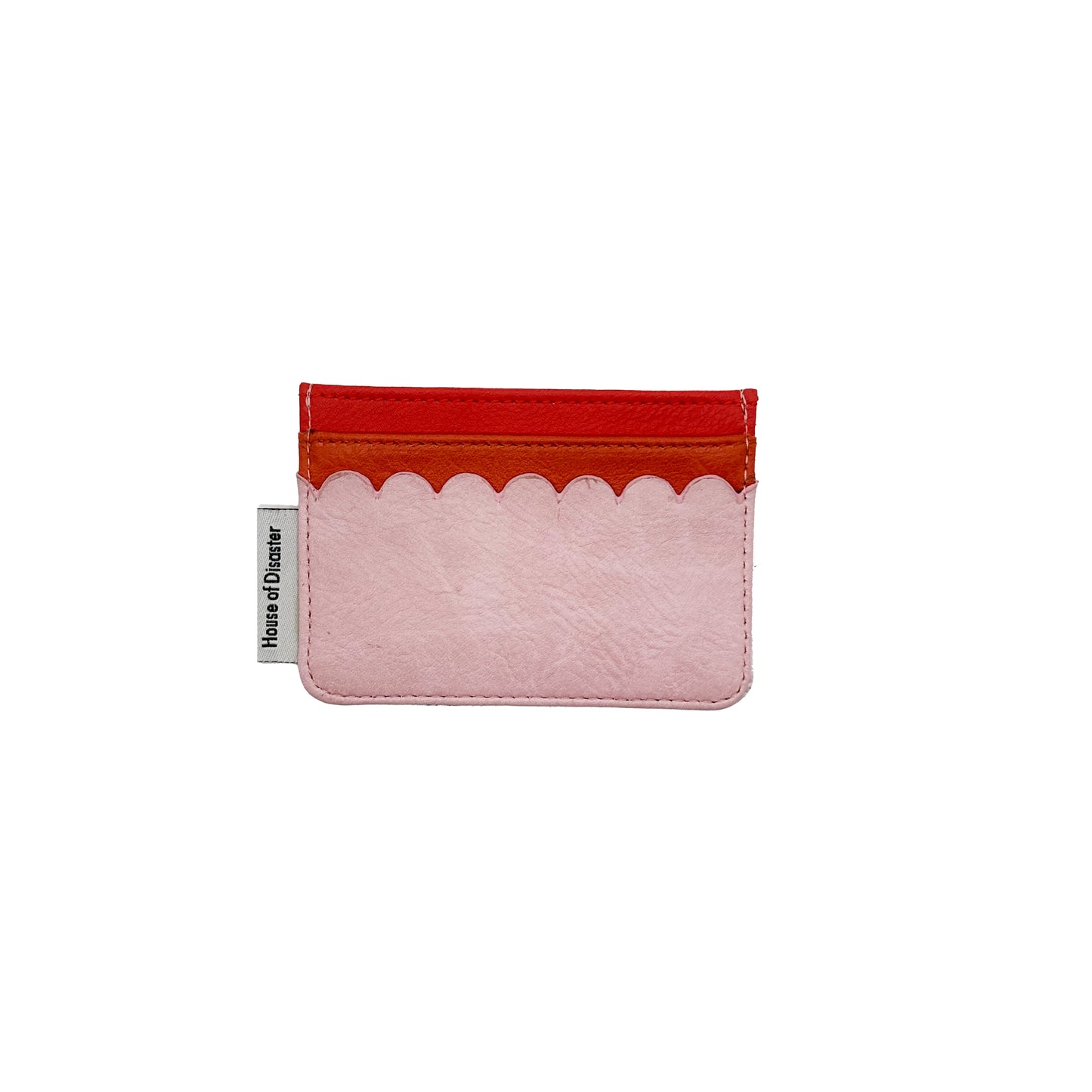 A compact Coral Lobster Card Holder featuring a pink lower section, red upper section, scalloped edging, hard-wearing PVC finish, and a House of Drew label on the side.