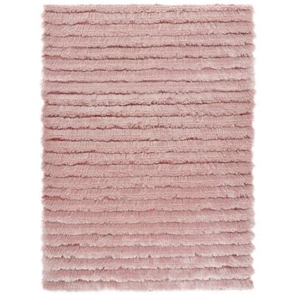 A rectangular pink shag rug with horizontal textured stripes, featuring a soft pile and a fluffy, cruelty-free look.