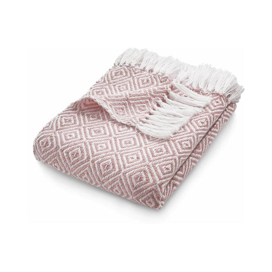 A folded pink and white throw blanket featuring a diamond pattern and white fringe on one end, ideal for pairing with recycled plastic rugs for a stylish, eco-friendly finish.