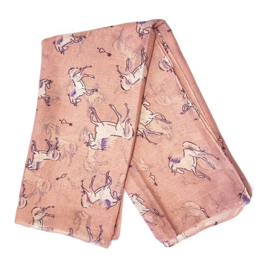 A folded Pink Unicorn Summer Scarf showcasing a repeating pattern of illustrated unicorns and small decorative details—ideal as a delightful vegan scarf or fanciful unicorn accessory.