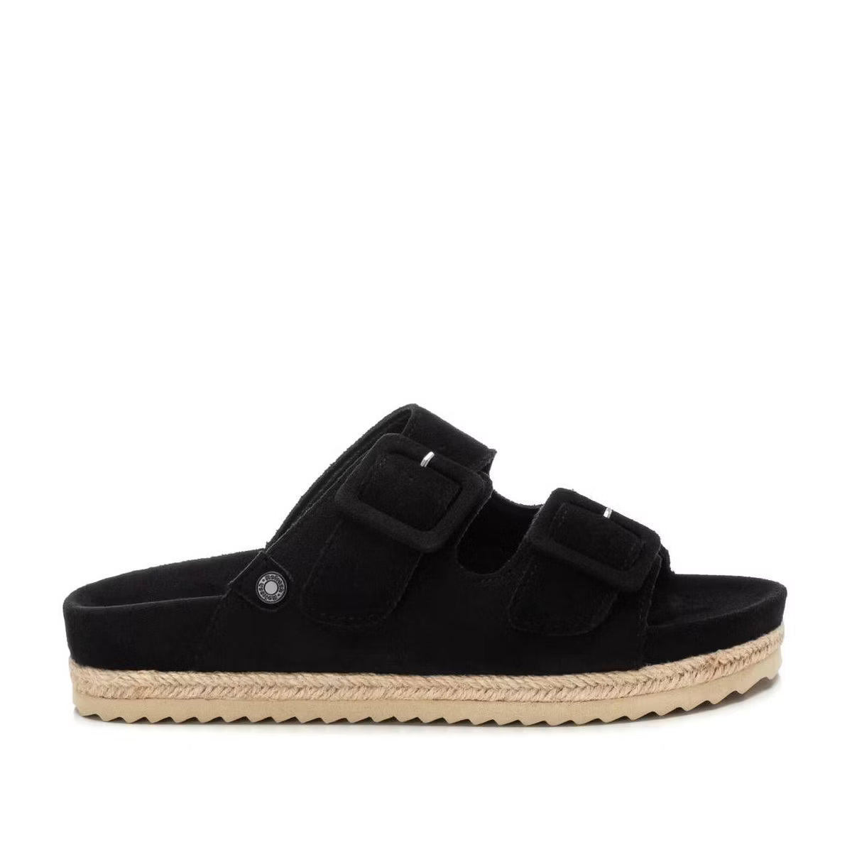 A black vegan suede sandal featuring two buckle straps and a beige espadrille-style flatform sole, displayed in a side profile view.