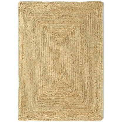 A rectangular, plant-based rug featuring a textured, geometric pattern and a light tan colour, crafted from natural fibres for an eco-friendly touch.