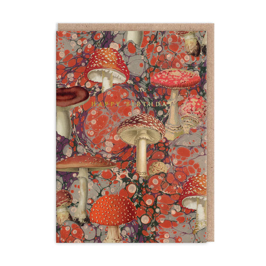 Celebrate with this A6 greeting card featuring marbled mushrooms in red and white. The kaleido card design cleverly hides Happy Birthday within the pattern, adding a playful touch to your special wishes.