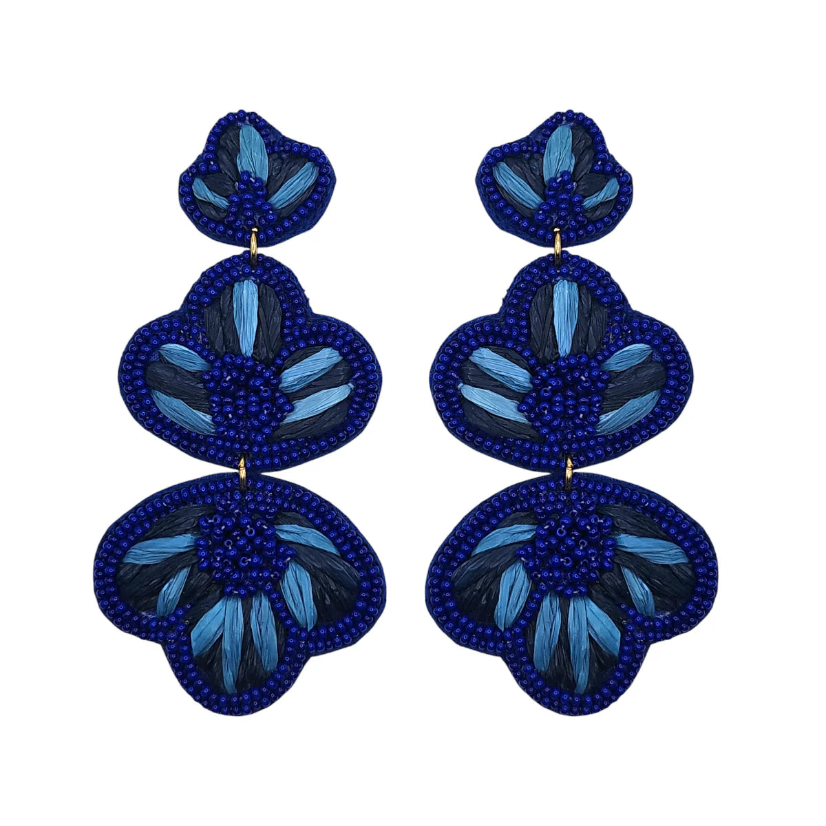 Blue ombré statement earrings featuring three stacked beaded floral shapes in blue and black, perfect for adding a bold touch to any outfit.