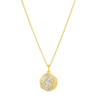 Gold chain necklace with a round, textured pendant adorned with tiny embedded crystals and engraved star motifs—an elegant piece of celestial jewellery reminiscent of a Starry Night Gold Necklace.