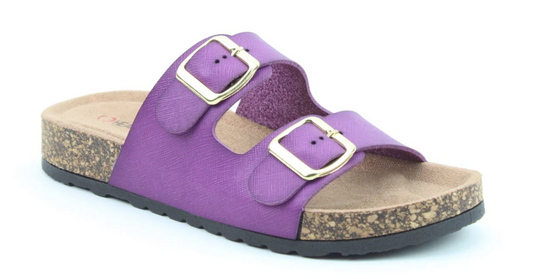 A purple vegan sandal featuring two adjustable buckle straps and a cork sole, ideal as premium summer footwear, shown against a white background.
