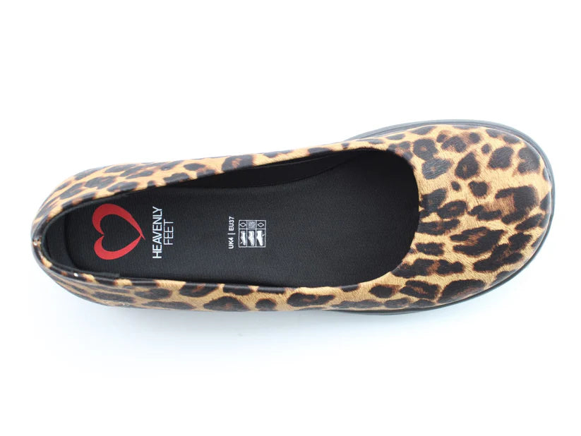 A single women’s flat vegan shoe featuring a leopard print design, black sole, and Heavenly Feet branding visible on the memory-foam insole.