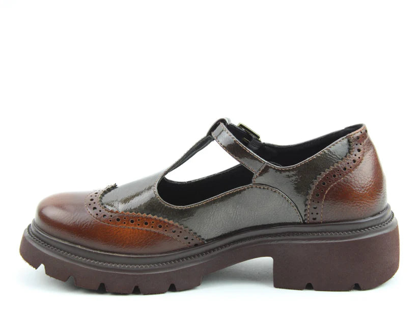 A brown and dark grey vegan T-bar brogue featuring classic detailing and a chunky, ridged sole, displayed in profile against a white background.