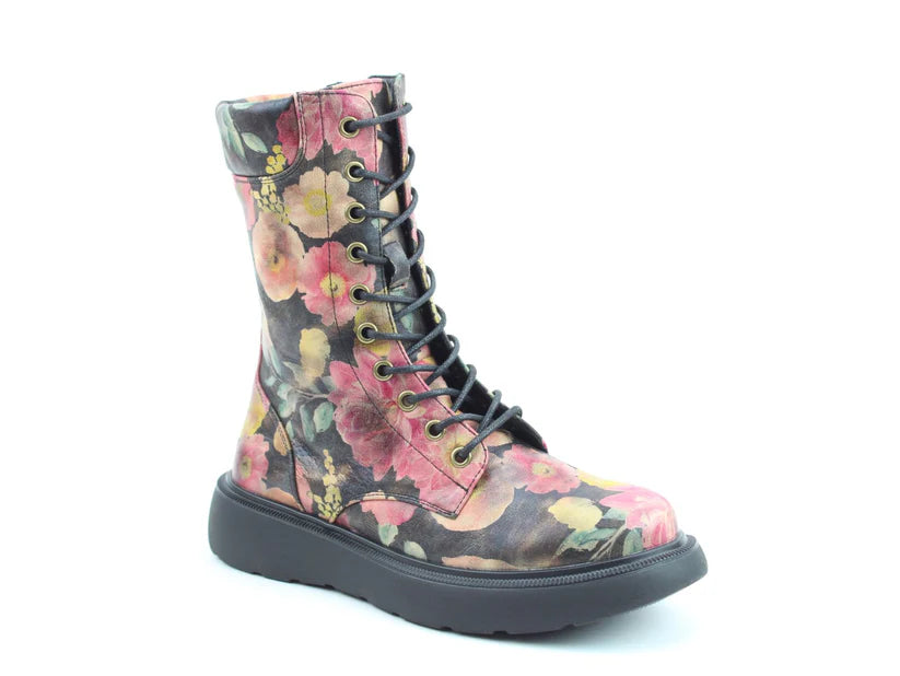 A single lace-up combat boot with a chunky black sole and a vibrant floral pattern on a dark background; these vegan boots also include a plush memory-foam insole for all-day comfort.