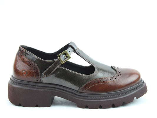 Brown leather Mary Jane shoe with brogue detailing, a buckle strap, and chunky sole, featuring memory-foam insoles for all-day comfort. Displayed in profile on a white background.
