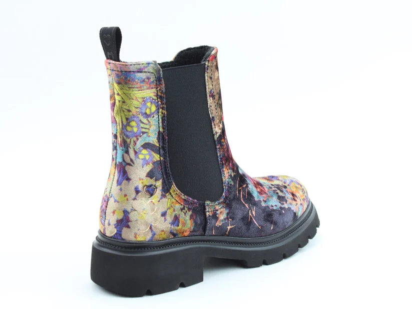 A colourful floral-patterned Chelsea boot, the Zeta Black Floral Boots feature a black elastic side panel, thick black sole and a comfortable memory foam footbed, shown from the back and side.