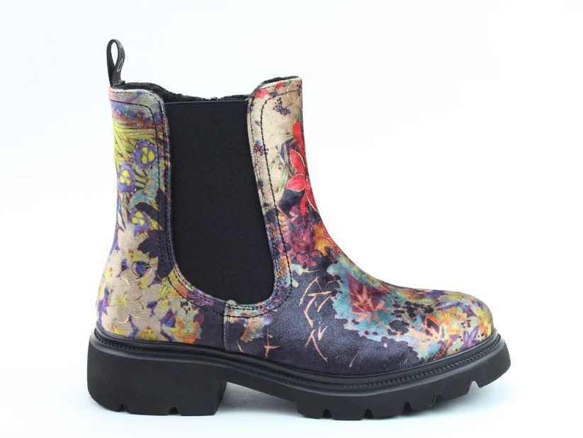 Colourful, floral-patterned Zeta Black Floral Boots featuring a black elastic side panel, chunky black sole, and memory foam footbed, shown against a plain white background.