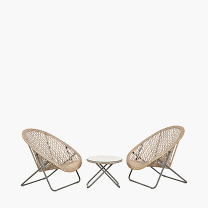 Two round rattan chairs with metal legs face each other, with a small round glass-topped table between them—an inviting garden furniture set against a plain white background.