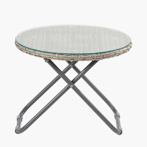 Round folding table with a wicker edge, glass top, and metal legs—ideal for pairing with rattan chairs as part of your garden furniture set. Shown against a plain white background.