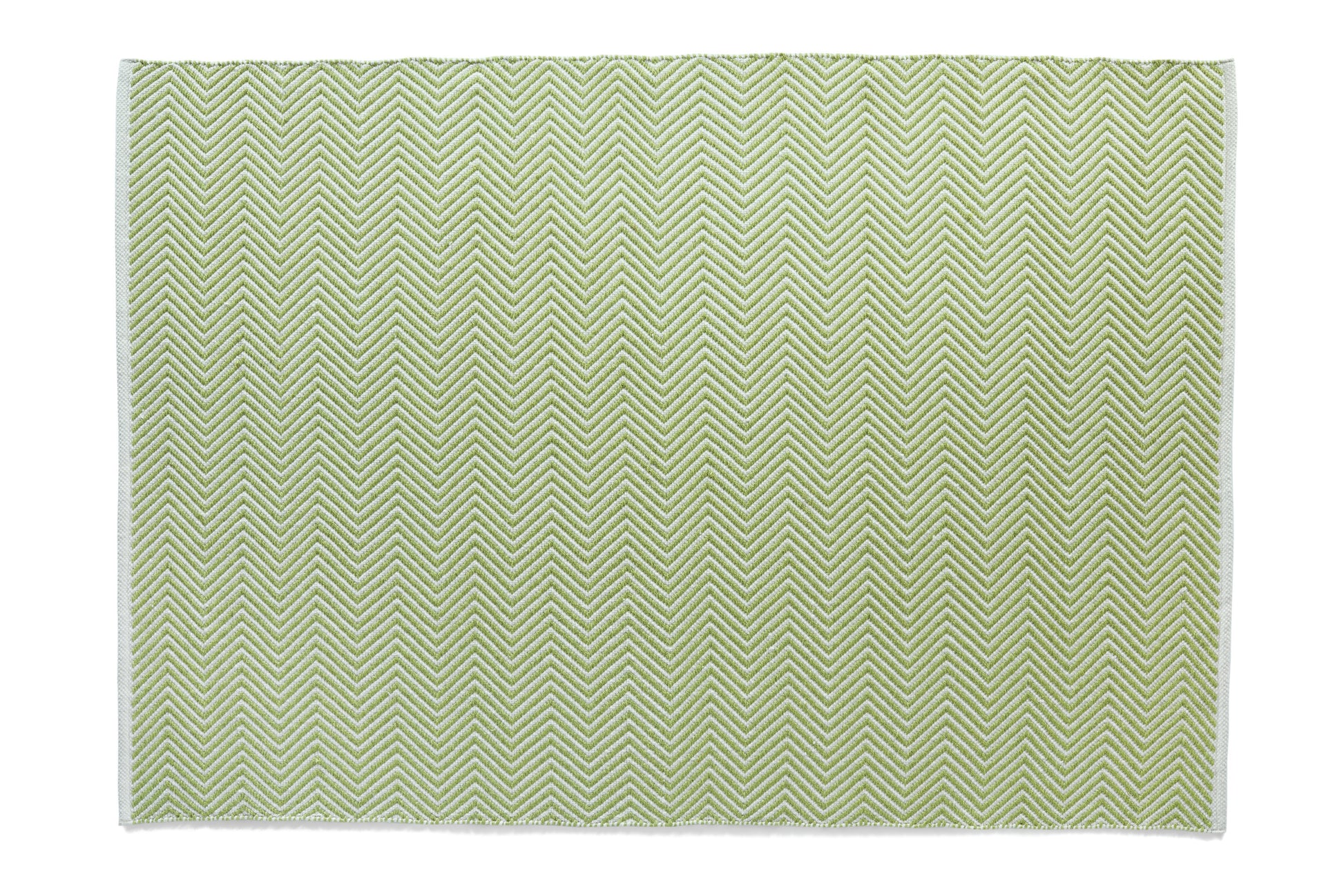 This square area rug features a UV-stable design with a green and white chevron pattern on a crisp white background, ideal for sustainable decor enthusiasts.