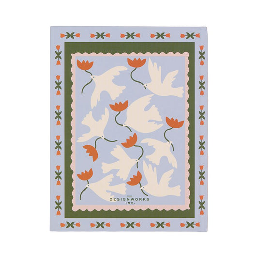 A rectangular mat featuring a pattern of white doves and red flowers on a light blue background, bordered by green and orange edges—ideal inspiration for your next floral journal or A Dopo Journal. “DESIGNWORKS INK.” is printed at the bottom.