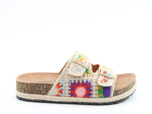 A vegan-friendly bio-sandal featuring a contoured footbed, two crocheted straps in colourful patterns, and adjustable twin buckles, set against a white background.