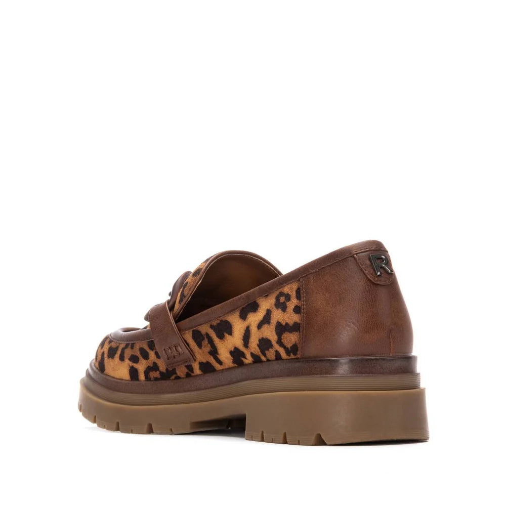 A brown vegan moccasin shoe with a chunky sole, featuring leopard print on the sides and a small embossed R logo on the back heel.