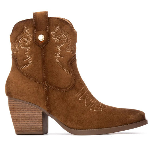 Brown suede ankle cowboy-style boot with decorative stitching, pull tab, and stacked block heel, shown in side profile on a white background—the perfect women’s boots for any occasion.