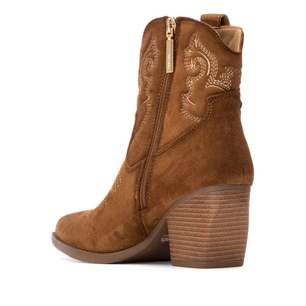 A brown suede ladies cowboy-style ankle boot featuring decorative stitching, a side zip fastening, and a stacked block heel.