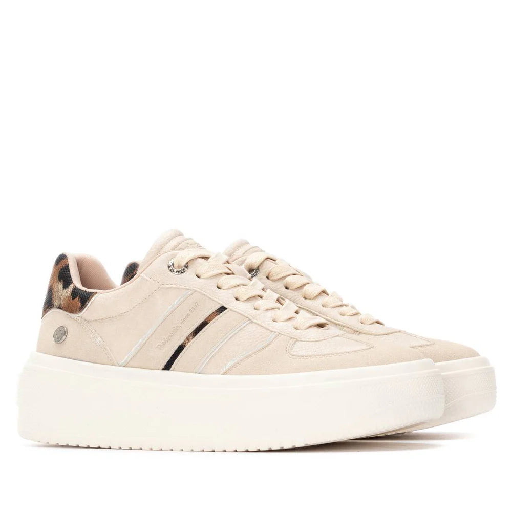 A pair of Leopard Beige vegan trainers featuring a suede finish, white non-slip rubber sole, stripe detailing, and leopard print accents on the heel—crafted from PETA-approved vegan materials.