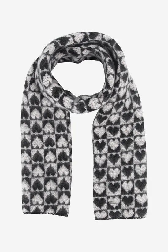 A black and white Heart Winter Vegan Scarf showcasing a repeating pattern of heart shapes set in a grid—ideal for adding both warmth and style to your winter scarf collection.