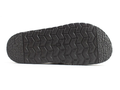 The image shows the underside of a Black Sequin Sandal sole, featuring a zigzag tread pattern and textured edges, crafted from vegan-friendly materials.