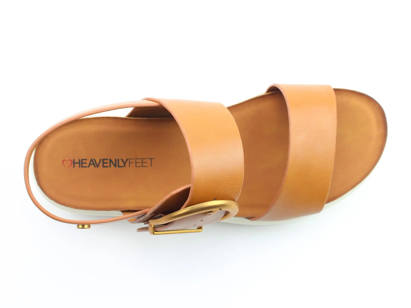 Brown sandal with two straps and a large buckle on the side, featuring the brand name Heavenly Feet printed on the insole. Perfect for a summer look, these sandals are vegan-friendly for those who seek style with a conscience.