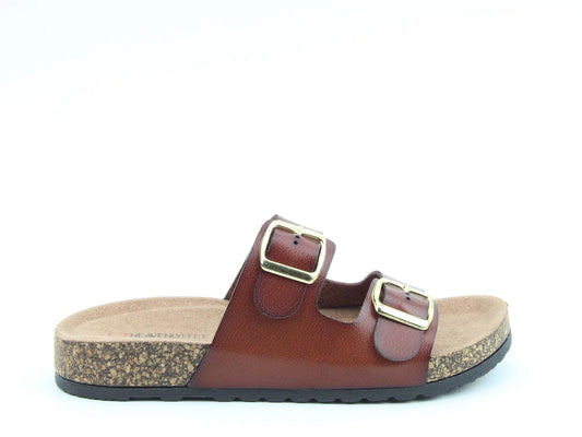 The Harmony2 Sandal features a vegan-friendly design with two adjustable buckle straps and a cork-textured sole, all showcased against a white backdrop.