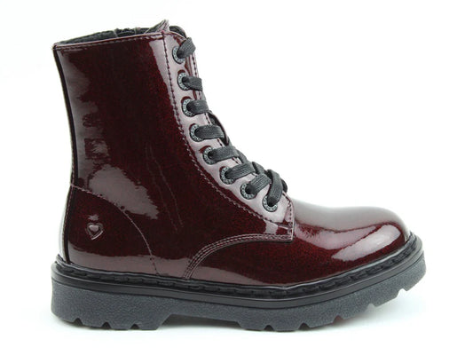 A glossy burgundy combat boot with black laces and stitching, a thick black sole, memory foam insoles, and a small embossed heart near the heel.
