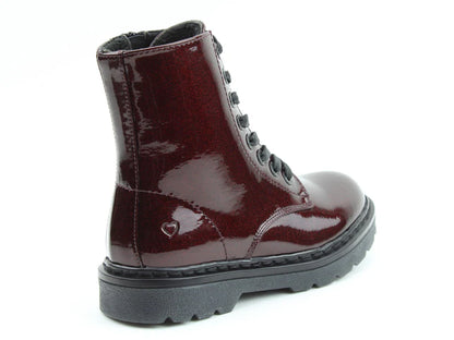 A glossy, dark red lace-up vegan-friendly boot with a chunky black sole and memory foam insoles, featuring a small heart detail on the side near the heel.
